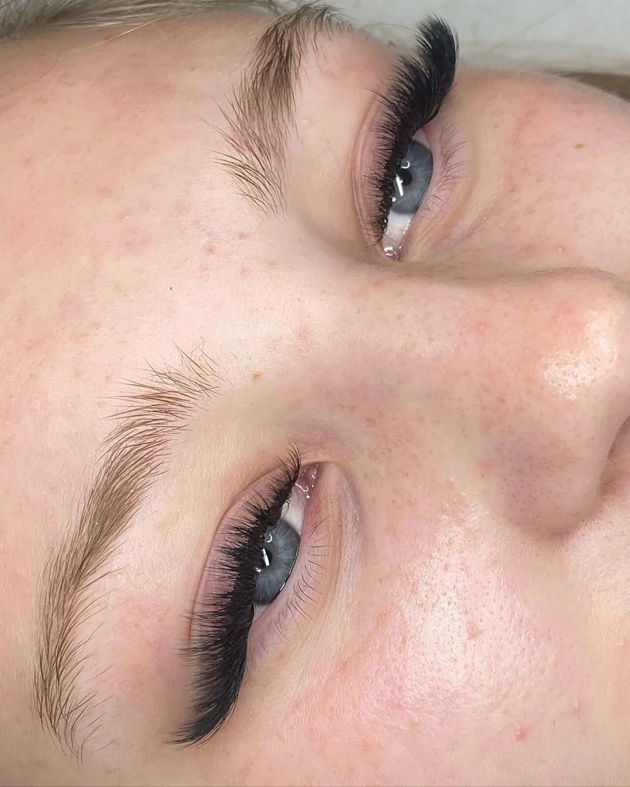 Close-up of a finished lash extension set with separated lashes